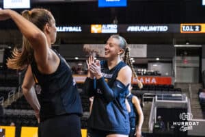 Team Thompson Elise Goetzinger (#13) cheers for her teammate before the Athletes Unlimited Volleyball match against Team Valentin-Anderson on Monday, October 13, 2025, in Omaha, Nebraska. Photo by Dawson Anderson.