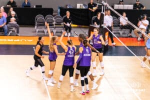 Team Hoffman celebrates a point together during the Athletes Unlimited Volleyball match against Team Hentz on Monday, October 13, 2025, in Omaha, Nebraska. Photo by Dawson Anderson.