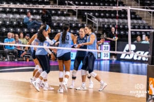Team Hentz celebrates a point together, with team captain Morgan Hentz (#46) spotted in the middle, during the Athletes Unlimited Volleyball match against Team Hoffman on Monday, October 13, 2025, in Omaha, Nebraska. Photo by Dawson Anderson.