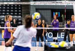 Team Hoffman Justine Wong-Orantes (#24) receives a ball from head coach Kayla Banwarth before the Athletes Unlimited Volleyball match against Team Hentz on Monday, October 13, 2025, in Omaha, Nebraska. Photo by Dawson Anderson.