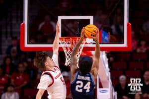Cornhusker Braden Frager (5) blocks a dunk attempt by guard Dominique Diomante (24) during a college basketball game, Saturday, October 18th, 2025, Lincoln, Nebraska. Photo by Braden Cochran.