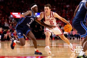 Nebraska's Pryce Sandfort (21) tries to make a move to the paint around AJ Dybansta (3) during a college basketball game, Saturday, October 18th, 2025, Lincoln, Nebraska. Photo by Braden Cochran.