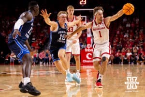 Nebraska Cornhusker Sam Hoiberg (1) reaches for the ball after being knocked away by a BYU defender during a college basketball game, Saturday, October 18th, 2025, Lincoln, Nebraska. Photo by Braden Cochran.