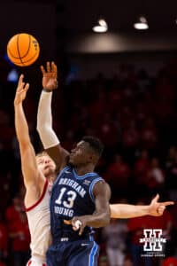 BYU Cougar Keba Kita (13) contests Nebraska Cornhusker Rienk Mast (51) for the tipoff during a college basketball game on Saturday, October 18th, 2025, Lincoln, Nebraska. Photo by Braden Cochran.