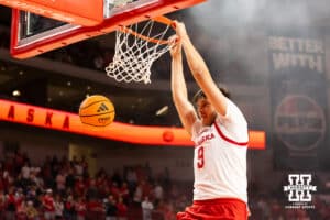 Nebraska Cornhusker forward Berke Buyutencel (9) brings a dunk down in warmups during a college basketball game on Saturday, October 18th, 2025, in Lincoln, Nebraska. Photo by Braden Cochran.