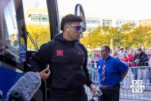 Nebraska Cornhusker quarterback Dylan Raiola (15) steps off the team bus before the college football game against the Minnesota Golden Gophers on Friday, October 17, 2025, in Minneapolis, Minnesota. Photo by John S. Peterson.