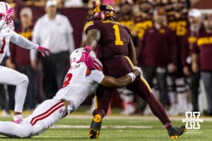 Nebraska Cornhusker defensive back Deshon Singleton (8) tackles Minnesota Golden Gopher running back Darius Taylor (1) during a college football game on Friday, October 17, 2025, in Minneapolis, Minnesota. Photo by John S. Peterson.