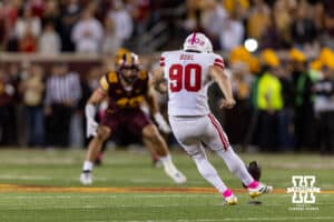 Nebraska Cornhusker kicker John Hohl (90) with the opening kickoff against the Minnesota Golden Gophers during a college football game on Friday, October 17, 2025, in Minneapolis, Minnesota. Photo by John S. Peterson.