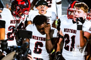 Westside's TayTay Jenkins (6) is celebrating with teammates after a big blowout win at Elkhorn South on Friday, October 10, 2025, in Omaha, Nebraska. Photo By Jack R. Stephens.