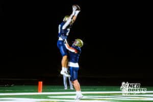Elkhorn South's Joey Kiscoan (20) and Griffin McDonald (0) celebrate after scoring the team's first touchdown of the game during a high school football game VS Westside on Friday, October 10, 2025, in Omaha, Nebraska. Photo By Jack R. Stephens.