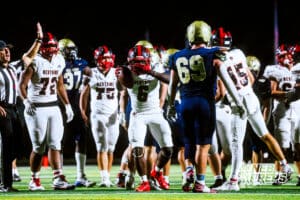 Westside's TayTay Jenkins (6) is celebrating after getting a huge gain for a first down during a high school football game at Elkhorn South on Friday, October 10, 2025, in Omaha, Nebraska. Photo By Jack R. Stephens.