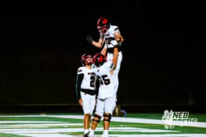 Westside's Braylen Warren (2), Owen James (65), and Eli Johnson (3) celebrate after a huge touchdown to increase the lead during a high school football game @ Elkhorn South on Friday, October 10, 2025, in Omaha, Nebraska. Photo By Jack R. Stephens.