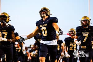 Elkhorn South's Griffin McDonald (0) screaming while running out with his teammates before a high school football game VS Westside on Friday, October 10, 2025, in Omaha, Nebraska. Photo By Jack R. Stephens.