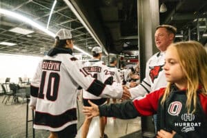 Omaha Maverick Jacob Guevin (10) and the team high fives fans after winning a college hockey game against Minnesota State on Friday, October 10, 2025, in Omaha, Nebraska. Photo by Dawson Anderson.