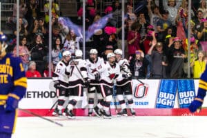 The Omaha Mavericks celebrate Aidan de La Gorgendiere's (22) first career goal during the third period of a college hockey game against Minnesota State on Friday, October 10, 2025, in Omaha, Nebraska. Photo by Dawson Anderson.