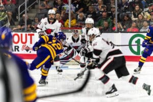 Omaha Maverick Simon Latkoczy (30) prepares to block a shot by Minnesota State Maverick Alex Zetterberg (12) during a college hockey game on Friday, October 10, 2025, in Omaha, Nebraska. Photo by Dawson Anderson.