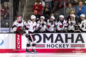 Omaha Maverick Marc Lajoie (24) highfives his teammates after scoring his first career goal during the third period against Minnesota State on Friday, October 10, 2025, in Omaha, Nebraska. Photo by Dawson Anderson.