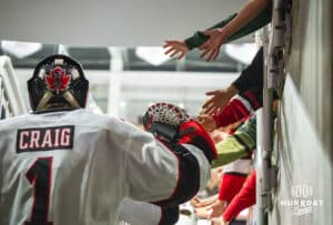 Omaha Maverick Will Craig (5) and the team walk out for the start of second period, greeted by young fans during a college hockey game against Minnesota State on Friday, October 10, 2025, in Omaha, Nebraska. Photo by Dawson Anderson.