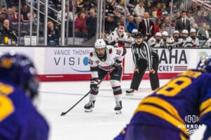 Omaha Maverick Jacob Guevin (10) focuses on the puck before a face-off during a college hockey game against Minnesota State on Friday, October 10, 2025, in Omaha, Nebraska. Photo by Dawson Anderson.