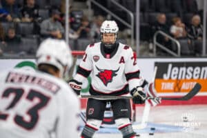 Omaha Maverick Tyler Rollwagen (21) warms up with teammate Maxime Pellerin (23) before a college hockey game Friday, October 10, 2025, in Omaha, Nebraska. Photo by Dawson Anderson.