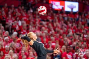 Nebraska Cornhusker Olivia Mauch (#10) serves during a college volleyball match against Washington on Friday, October 10, 2025, in Lincoln, Nebraska. Photo by Brandon Tiedemann.