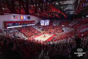 Nebraska Cornhusker fans participate in a stripe out during a college volleyball match against Washington on Friday, October 10, 2025, in Lincoln, Nebraska. Photo by Brandon Tiedemann.
