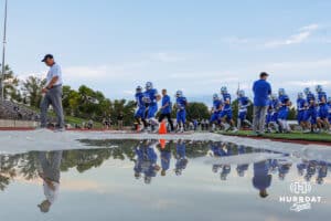 Tim Johnk leads the team into the locker room before the Creighton Prep football game vs Fremont on October 10th, 2025, in Omaha, Nebraska. Photo by Drew Balus.