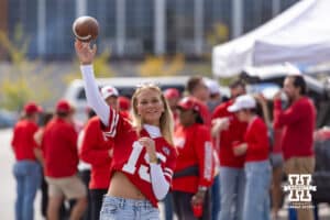 Tailgating Nebraska Cornhusker fans throwing the football before the college football game against the Maryland Terrapins on Saturday, October 11, 2025, in College Park, MD. Photo by John S. Peterson.