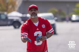 Nebraska Cornhuskers fan playing cornhole before the college football game against the Maryland Terrapins on Saturday, October 11, 2025, in College Park, MD. Photo by John S. Peterson.