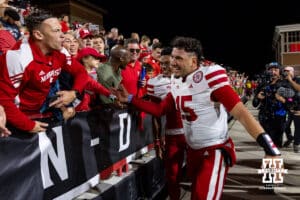 Nebraska Cornhusker quarterback Dylan Raiola (15) celebrating the win over Maryland with the Husker fans during a college football game on Saturday, October 11, 2025, in College Park, MD. Photo by John S. Peterson.