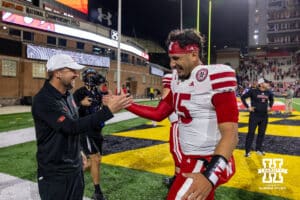 Nebraska Cornhusker quarterback Dylan Raiola (15) shakes hands with Glenn Thomas after the win over the Maryland Terrapins during a college football game on Saturday, October 11, 2025, in College Park, MD. Photo by John S. Peterson.