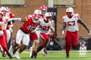 Nebraska Cornhusker running back Emmett Johnson (21) breaks through the line against the Maryland Terrapins in the third quarter during a college football game on Saturday, October 11, 2025, in College Park, MD. Photo by John S. Peterson.