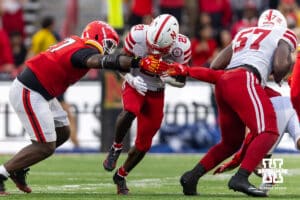 Nebraska Cornhusker running back Emmett Johnson (21) runs the ball against Maryland Terrapins defenders in the third quarter during a college football game on Saturday, October 11, 2025, in College Park, MD. Photo by John S. Peterson.