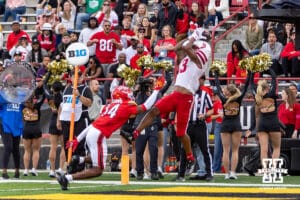 Nebraska Cornhusker wide receiver Nyziah Hunter (13) makes a catch for a touchdown against Maryland Terrapin defensive back Jamare Glasker (14) in the second quarter during a college football game on Saturday, October 11, 2025, in College Park, MD. Photo by John S. Peterson.