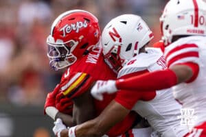Nebraska Cornhusker defensive back Deshon Singleton (8) tackles Maryland Terrapin running back Dejuan Williams (0) in the first quarter during a college football game on Saturday, October 11, 2025, in College Park, MD. Photo by John S. Peterson.