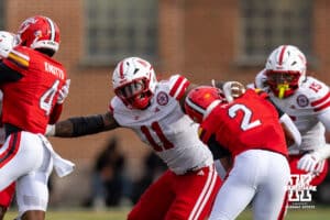 Nebraska Cornhusker defensive lineman Cameron Lenhardt (11) reaches for Maryland Terrapin running back Nolan Ray (2) in the first quarter during a college football game on Saturday, October 11, 2025, in College Park, MD. Photo by John S. Peterson.