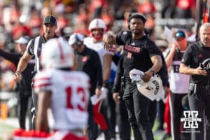 Nebraska Cornhuskers wide recievers coach Daikiel Shorts Jr. communicate with wide receiver Nyziah Hunter (13) against the Maryland Terrapins in the first quarter during a college football game on Saturday, October 11, 2025, in College Park, MD. Photo by John S. Peterson.