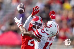 Nebraska Cornhusker wide receiver Nyziah Hunter (13) tries to catch the ball with Maryland Terrapin defensive back La'Khi Roland (27) gets call for pass interference in the first quarter during a college football game on Saturday, October 11, 2025, in College Park, MD. Photo by John S. Peterson.