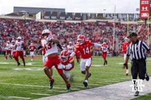 Nebraska Cornhusker wide receiver Nyziah Hunter (13) runs with the ball against Maryland Terrapin defensive back Ricardo Cooper Jr. (25) in the first quarter during a college football game on Saturday, October 11, 2025, in College Park, MD. Photo by John S. Peterson.