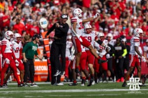 Nebraska Cornhuskers coach Mike Ekeler and defensive back Donovan Jones (37) celebrates stop against the Maryland Terrapins in the first quarter during a college football game on Saturday, October 11, 2025, in College Park, MD. Photo by John S. Peterson.