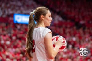 Nebraska Cornhusker Bergen Reilly (#2) waits to serve during a college volleyball match against Washington on Friday, October 10, 2025, in Lincoln, Nebraska. Photo by Brandon Tiedemann.