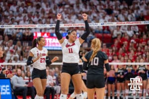 Nebraska Cornhusker Teraya Sigler (#11) celebrates a point during a college volleyball match against Washington on Friday, October 10, 2025, in Lincoln, Nebraska. Photo by Brandon Tiedemann.