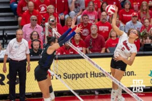 Nebraska Cornhusker Rebekah Allick (#5) spikes the ball during a college volleyball match against Washington on Friday, October 10, 2025, in Lincoln, Nebraska. Photo by Brandon Tiedemann.