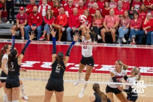 Nebraska Cornhusker Harper Murray (#27) sets the ball during a college volleyball match against Washington on Friday, October 10, 2025, in Lincoln, Nebraska. Photo by Brandon Tiedemann.