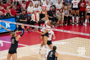 Nebraska Cornhusker Rebekah Allick (#5) spikes the ball during a college volleyball match against Washington on Friday, October 10, 2025, in Lincoln, Nebraska. Photo by Brandon Tiedemann.