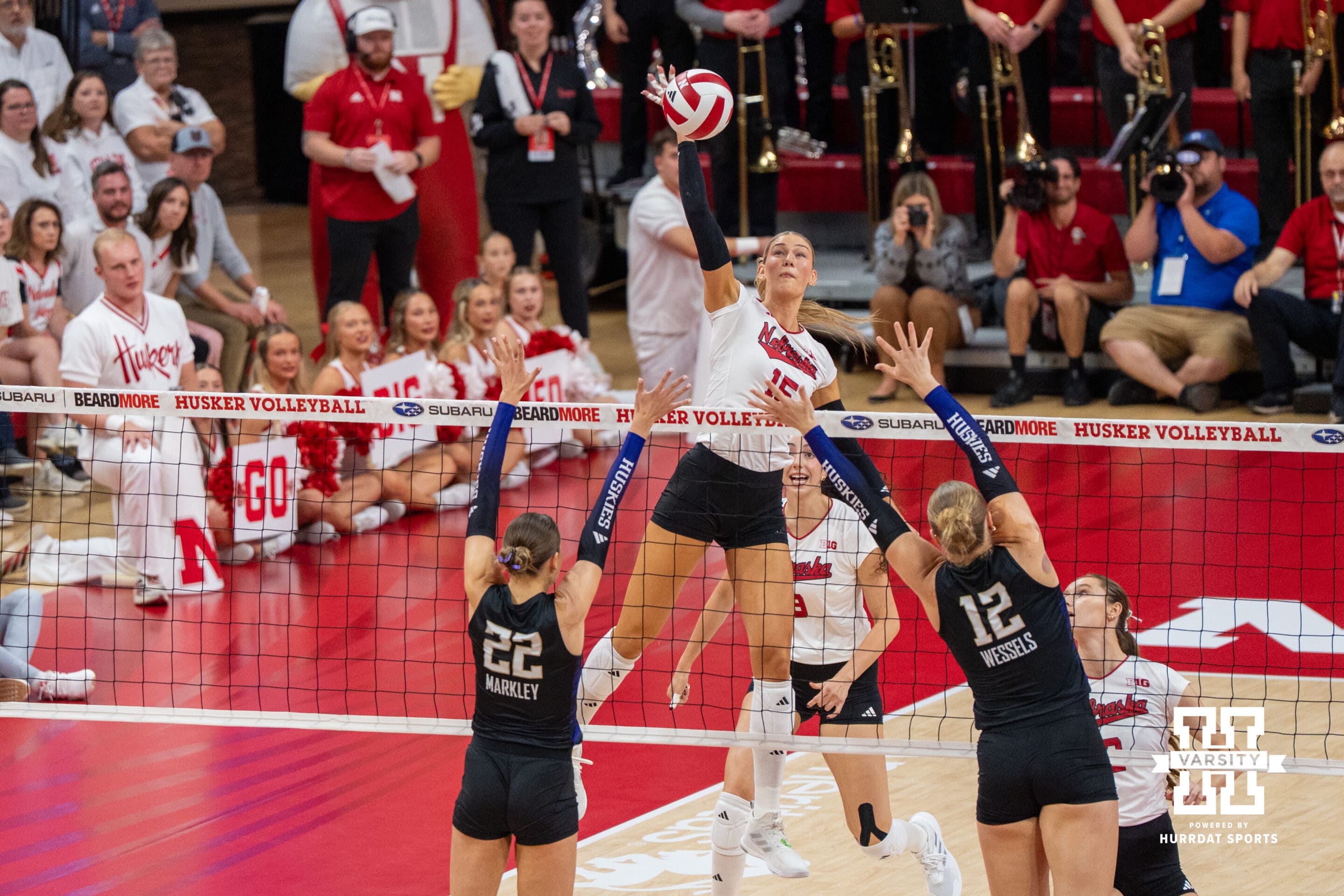 Nebraska Cornhusker Andi Jackson (#15) hits the ball during a college volleyball match against Washington on Friday, October 10, 2025, in Lincoln, Nebraska. Photo by Brandon Tiedemann.