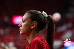 Nebraska Cornhusker Harper Murray (#27) warms up before a college volleyball match against Washington on Friday, October 10, 2025, in Lincoln, Nebraska. Photo by Brandon Tiedemann.