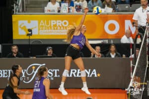 Team Hoffman Brooke Nuneviller (#50) spikes the ball during the Athletes Unlimited Volleyball match against Team Thompson on Thursday, October 9, 2025, in Omaha, Nebraska. Photo by Brandon Tiedemann.