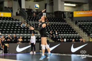 Team Thompson Elise Goetzinger (#13) serves the ball during the Athletes Unlimited Volleyball match against Team Hoffman on Thursday, October 9, 2025, in Omaha, Nebraska. Photo by Brandon Tiedemann.
