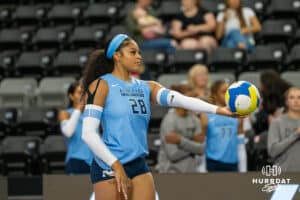 Team Hentz Kayla Caffey (#28) waits to serve during the Athletes Unlimited Volleyball match against Team Valentin-Anderson on Thursday, October 9, 2025, in Omaha, Nebraska. Photo by Brandon Tiedemann.